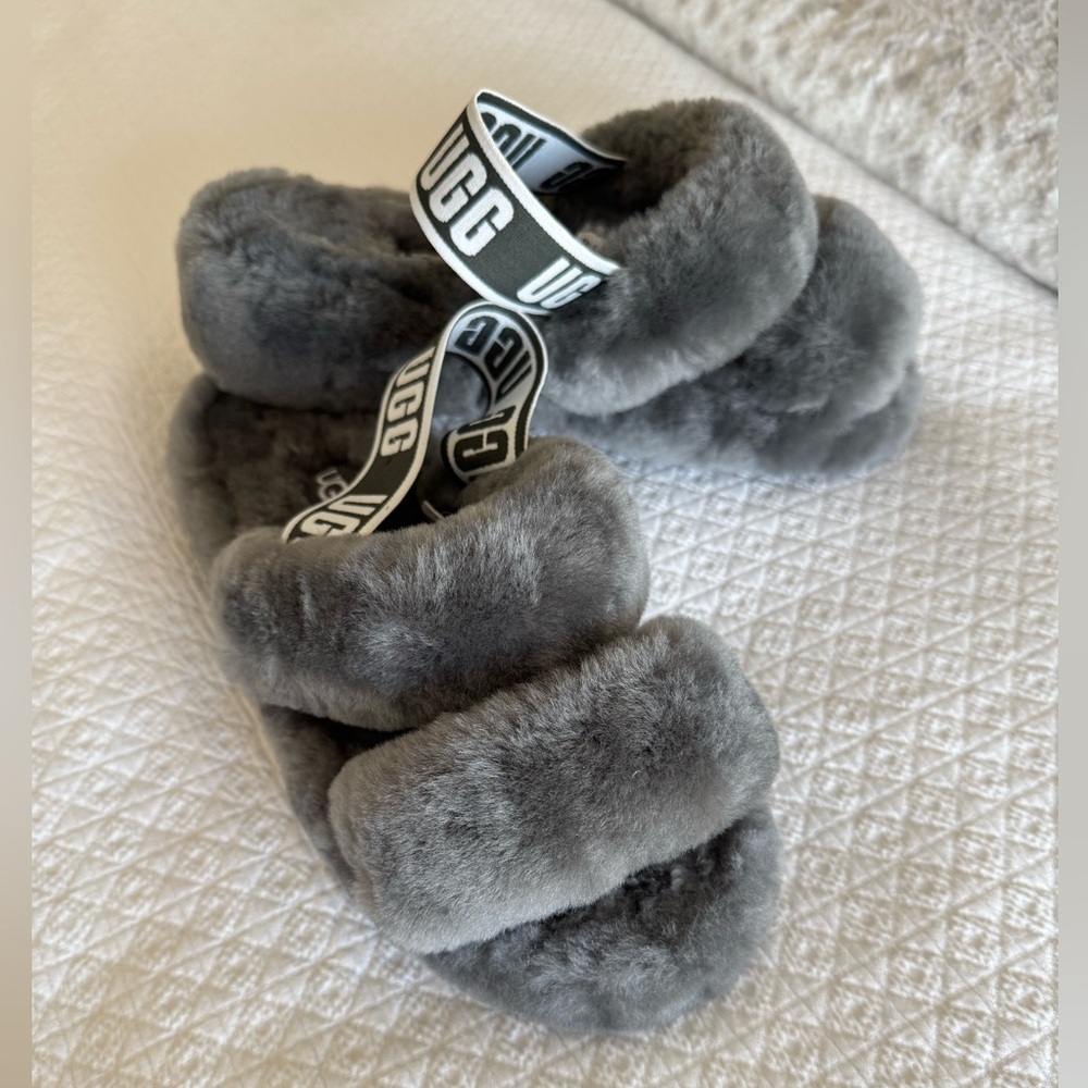 UGG fuzzy grey slip on slipper, size 9